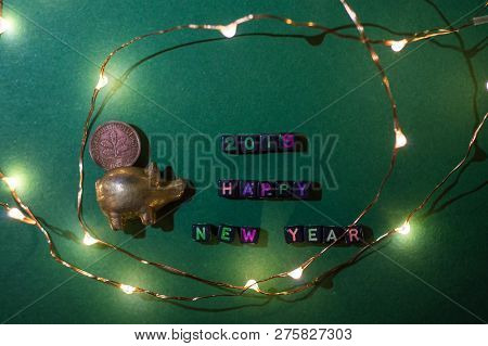Gilded Statuette Of A Pig With A Manet, New Years Business Concept