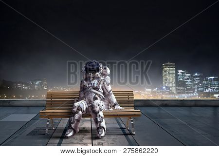 Rocketman on bench. Mixed media