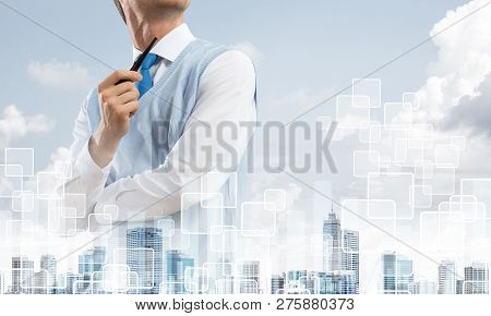 Double Exposure Of Confident And Young Businessman In Smart-casual Wear Smoking Pipe And Modern City
