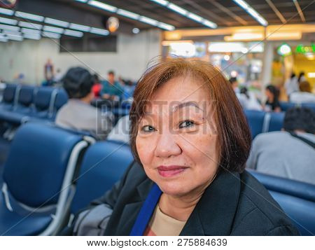 Close Up Senior Asian Woman In Don Muang Internation Airport Bangkok Thailand.