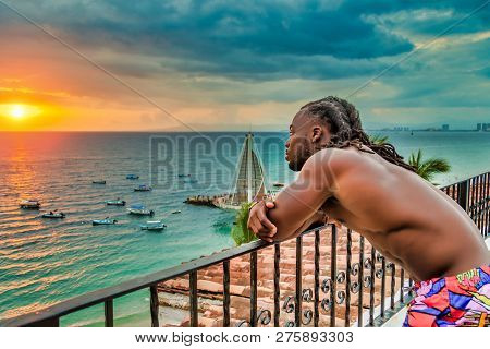 Young, Handsome, Muscular, Shirtless African American Man Enjoying The Sunset In Puerto Vallarta, Me