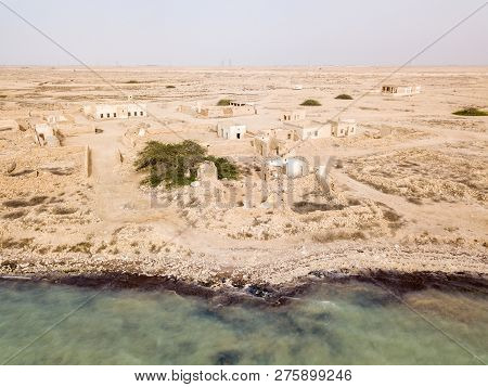Ruined Ancient Old Arab Pearling And Fishing Town Al Jumail, Qatar. Desert At Coast Of Persian Gulf.