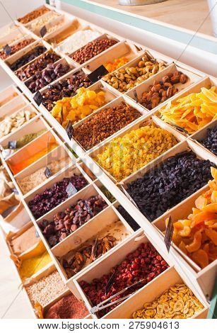 Top View Of Various Dry Fruit, Raisins And Nuts At The Shop