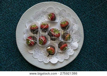 An Above View Of Fancy, Gourmet Chocolate Coated Strawberries On A Plate.