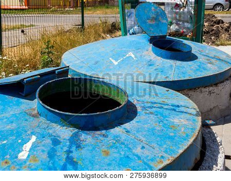 Site For Household Waste With Large Metal Containers