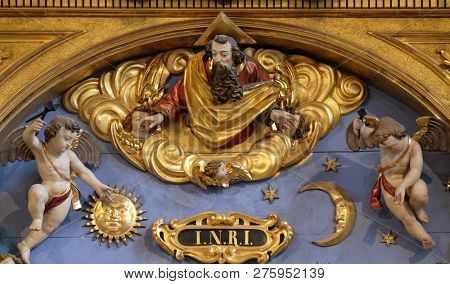 LUCERNE, SWITZERLAND - JUNE 24, 2018: God the father statue on the Soul altar in the church of St. Leodegar in Lucerne, Switzerland