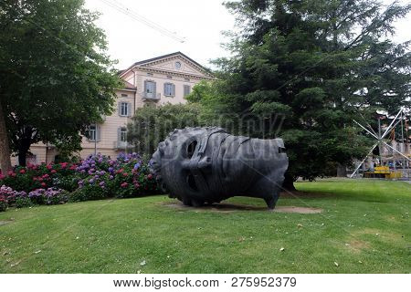 LUGANO, SWITZERLAND - JUNE 24, 2018: Famous monument shaped head called 