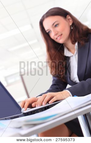 picture of happy woman with laptop computer