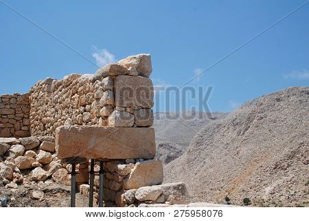 A restored ancient retaining wall in the hills above Chorio on the Greek island of Halki. Built in the isodomic style of masonry, the wall dates from the 4th Century BC.