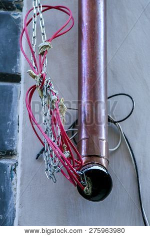 Closeup Of Water Downspout On The House Roof. Rain Drainpipe At The House Wall In Riga, Latvia.