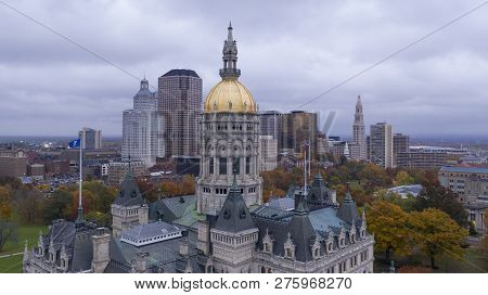 Downtown Buildings Under A Dark Sky At The Connecticut State Capitol Building In Hartford