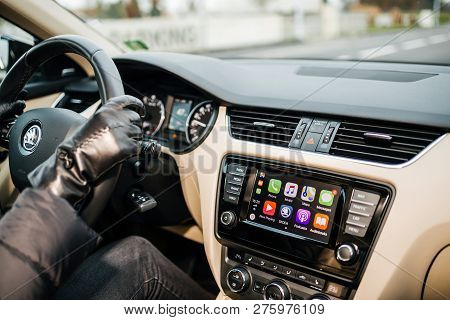 Strasbourg, France - Dec 26, 2018: Woman Driving Skoda Octavia Czech Car Wearing Leather Gloves With