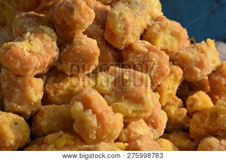 Close up of delicious crispy crunchy Bengali sweet goja, gaja with sugar coating in the shop in open