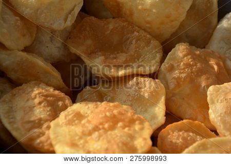Close Up Of Poori, Deep Fried Bread Kept In A Dish