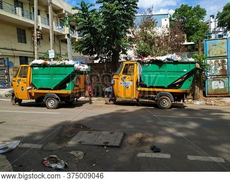 Bangalore, Karnataka/india-june 30 2020: Closeup Of Garbage Collecting Green And Yellow Color Auto P