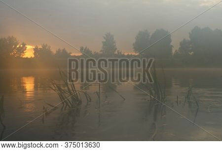 Morning Landscape On The Sejm River, Ukraine, Fog Over The Water And Sunrise