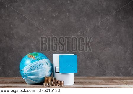 Financial Crisis Of Oil On The Planet Associated With The Epidemic. Globe With A Bandage And A Barre