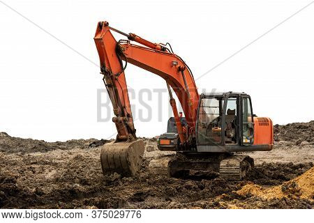 Excavator Backhoe On The Ground Isolated On White Background With Clipping Path