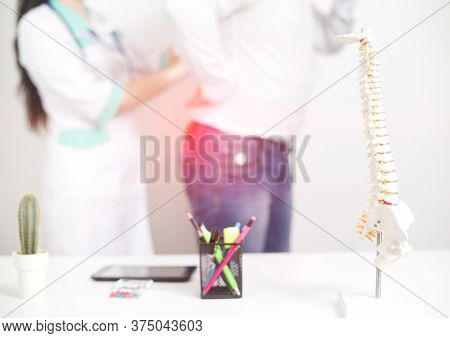 Male Patient At The Appointment With A Doctor Vertebrologist. Diagnosis And Treatment Of Back Pain D