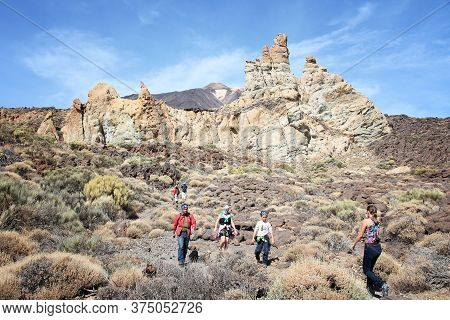 Tenerife, Spain - October 29, 2012: Tourists Visit Volcanic Landscape Of Teide National Park In Tene