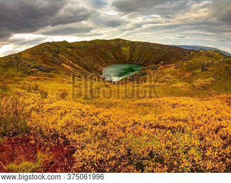 Volcanic Crater Kerid With Blue Lake Inside, At Autumn Day, Iceland Gold Circle Tourist Attraction.