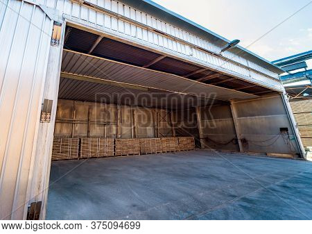 Lumber Ready For Loading Into A Dry Kiln. Wood Drying In Containers