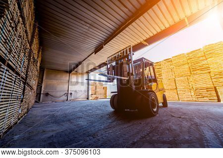 Forklift Loader Load Lumber Into A Dry Kiln. Wood Drying In Containers.