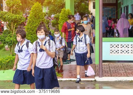 Kanchanaburi,thailand-july 2,2020:thai Students Wear Various Medical Masks To Prevent Themselves Fro
