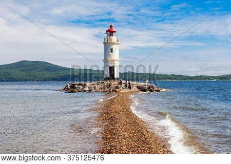 Lighthouse Tokarevskiy Egersheld On Tokarevskaya Koshka Cape In Vladivostok, Primorsky Krai In Russi