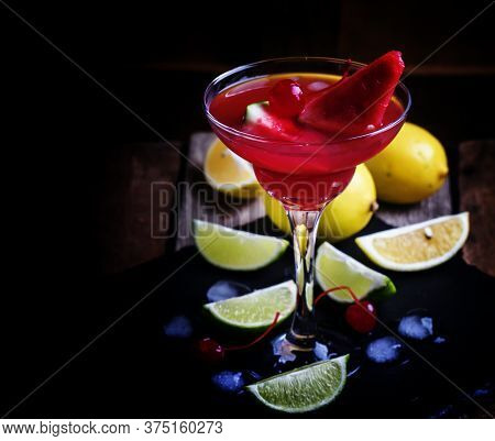 Alcoholic Cocktail With Watermelon, Lemon, Lime, Tequila And Ice, Black Background, Selective Focus