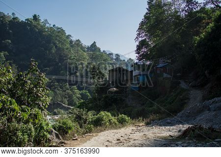 Village With Tea Houses And A Suspention Bridge, Annapurna Circuit, Nepal