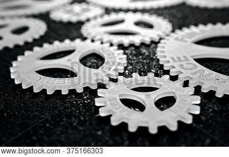 Several Gears With Different Inscription. Topic Of Finance. In Focus Sales Service