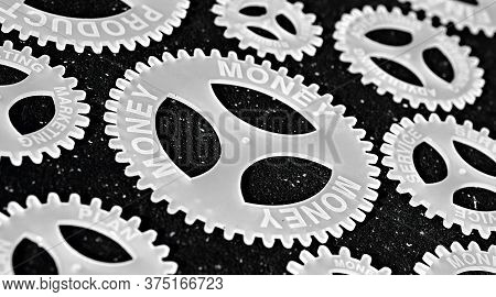 Several Gears With Different Inscription. Topic Of Finance. In Focus Money Marketing Service