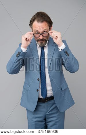Difficult Question. Perplexedly Removes Glasses. Business Education. Serious Businessman. Education 