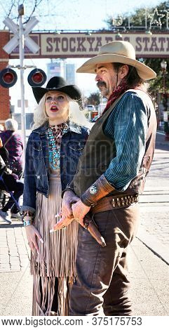 Fort Worth,texas, Jan.4,2020 - Cowboy And Cowgirl At The Fort Worth Stockyards Which Happens Ever Da