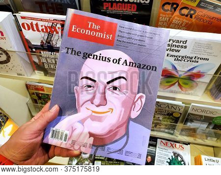 Montreal, Canada - June 30, 2020: The Genius Of Amazon Title And A Picture Of Jeff Bezos As The Dr E