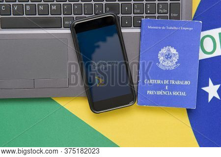 Florianopolis, Brazil, June 27, 2020: Top View Of Cell Phone With The Brazilian Emergency Aid Applic