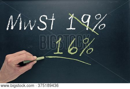 Conceptual Image With A Man Writing On A Chalkboard For Economic Stimulus Package For Germany.