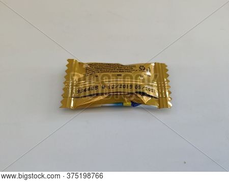 Closeup Of Front And Back View Of The Vicks Ginger Cough Drops 2.0G Candy Pack Isolated On White Bac