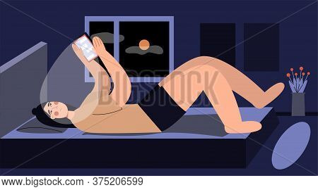 Girl Using Phone Night. Cute Woman Chatting On The Phone On The Bed. Social Networks. Spend Time At 