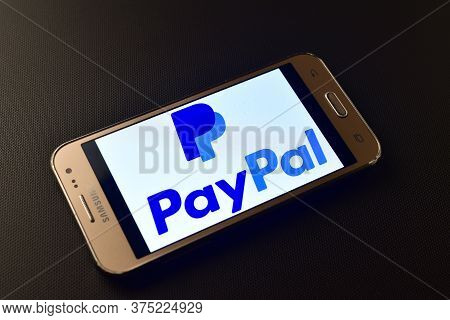 Italy - February 10, 2019:  Paypal Logo On Smartphone Screen. Paypal Is An American Online Payment A