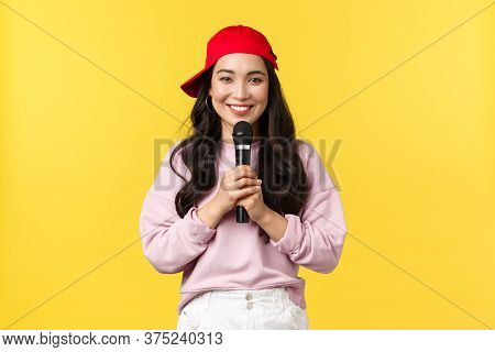 People Emotions, Lifestyle Leisure And Beauty Concept. Cute Smiling Asian Woman Performer Singing So