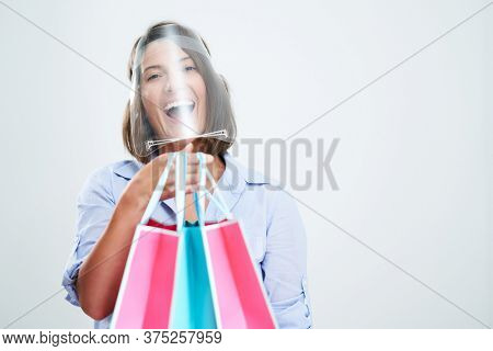 Attractive woman wearing protective shield isolated over white background