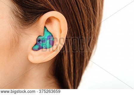 Personally Molded Earplugs For Use In An Airplane At High Atmospheric Pressure With Pressure Valve. 