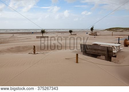 Sand Covered Restaurant . The Beach In Hargen Aan Zee In Netherlands Without Foreign Tourists After 