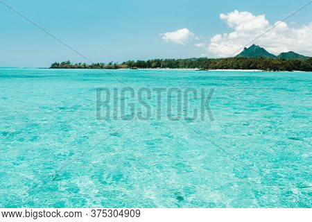 Turquoise Indian Ocean Near The Island Of Mauritius, Tropical Nature And Coral Reef In Mauritius.