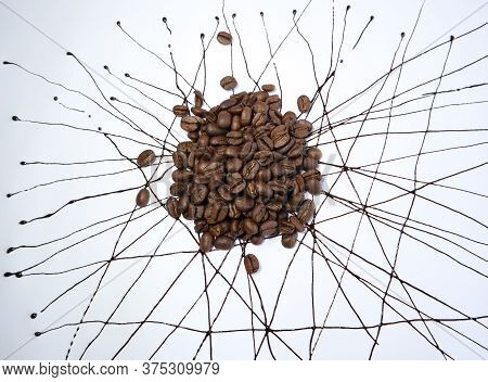 Coffeebeans And The  Background Is Painted With Coffee Syrup