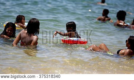 Salvador, Bahia / Brazil - January 1, 2015: Children Are Seen Without The Company Of An Adult At Boa