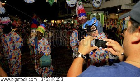 Cairu, Bahia / Brazil - November 14, 2013: Members Of The Caretas De Cairu Culture Group Are Seen Du