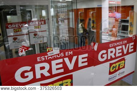 Salvador, Bahia / Brazil - October 5, 2016: Poster With Bank Strike Information Is Seen On Itau Bank